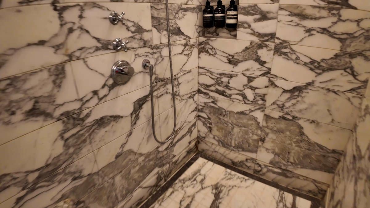 Shower controls and amenity bottles