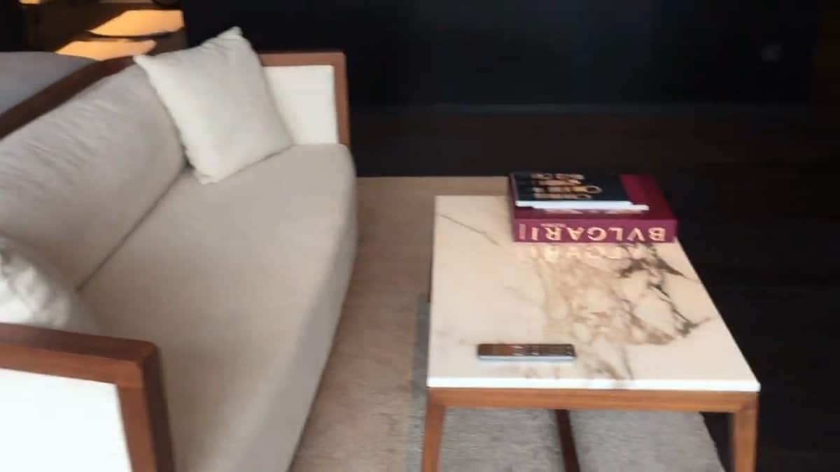 Sofa end with stacked books