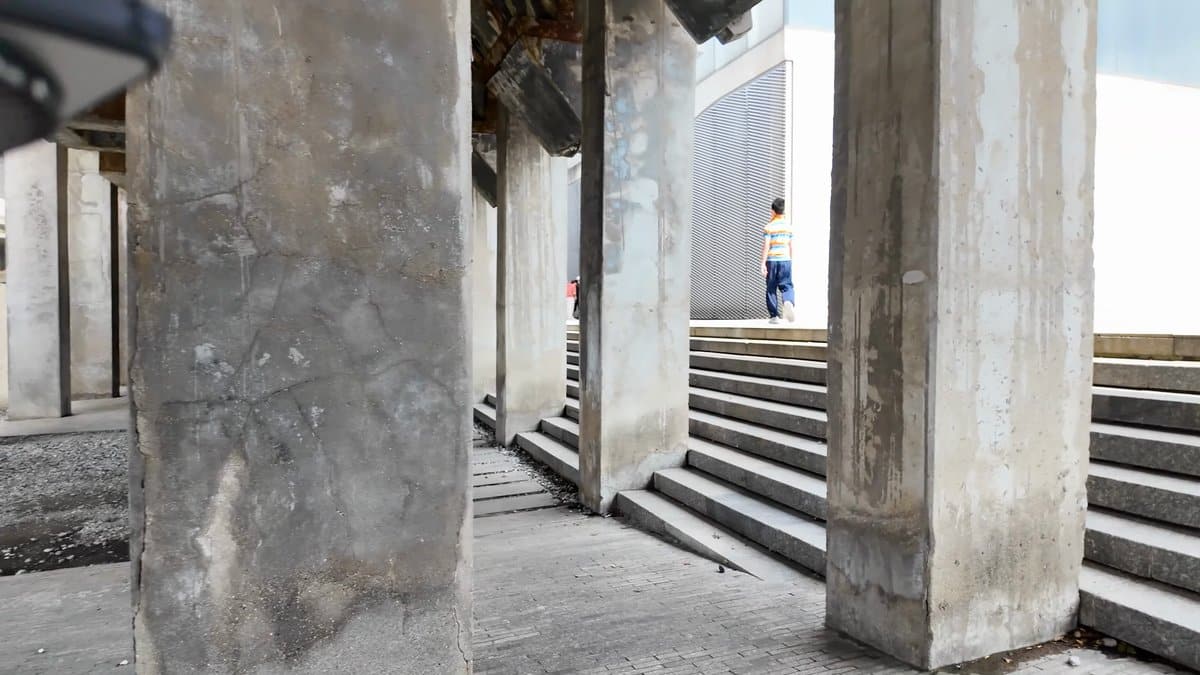 Steps rising beside the colonnade