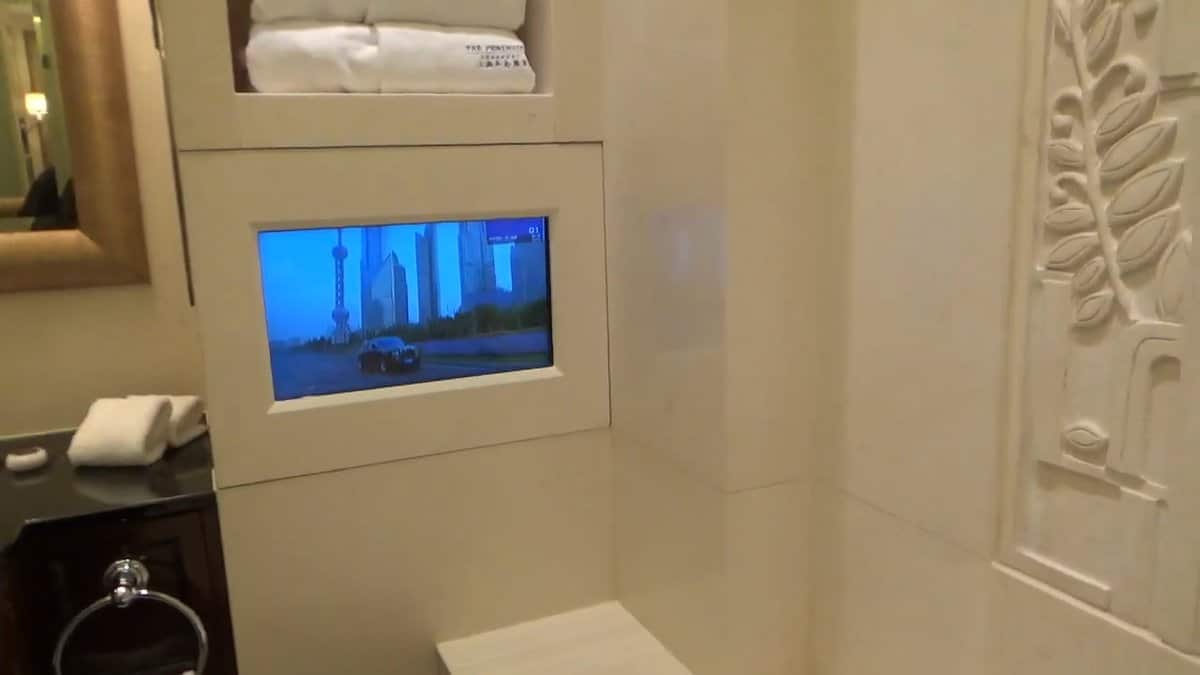 Television set into bathroom marble