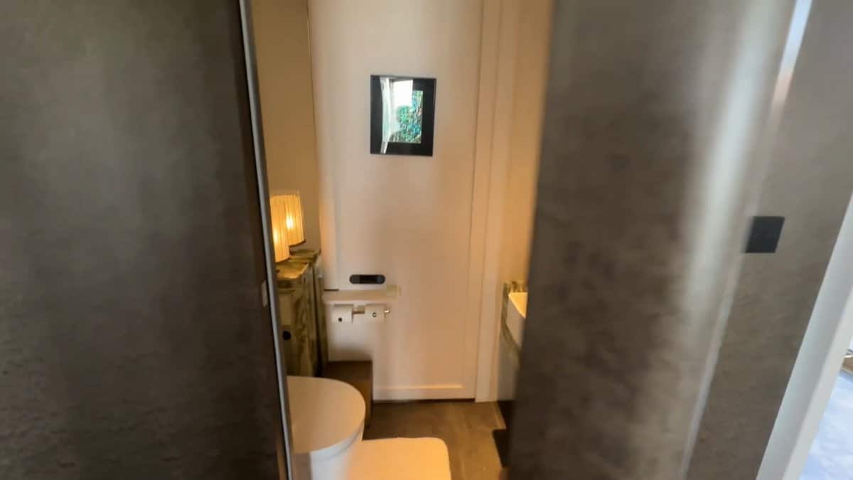 The passage through the bathroom, a small framed