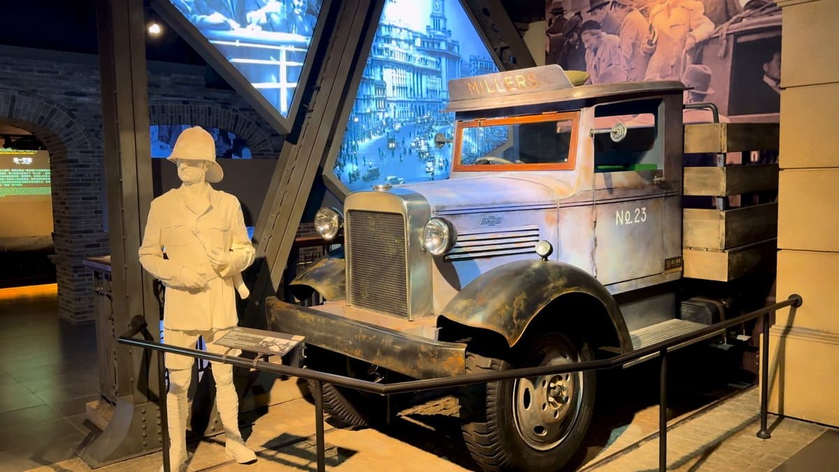 The period truck and uniformed mannequin against a