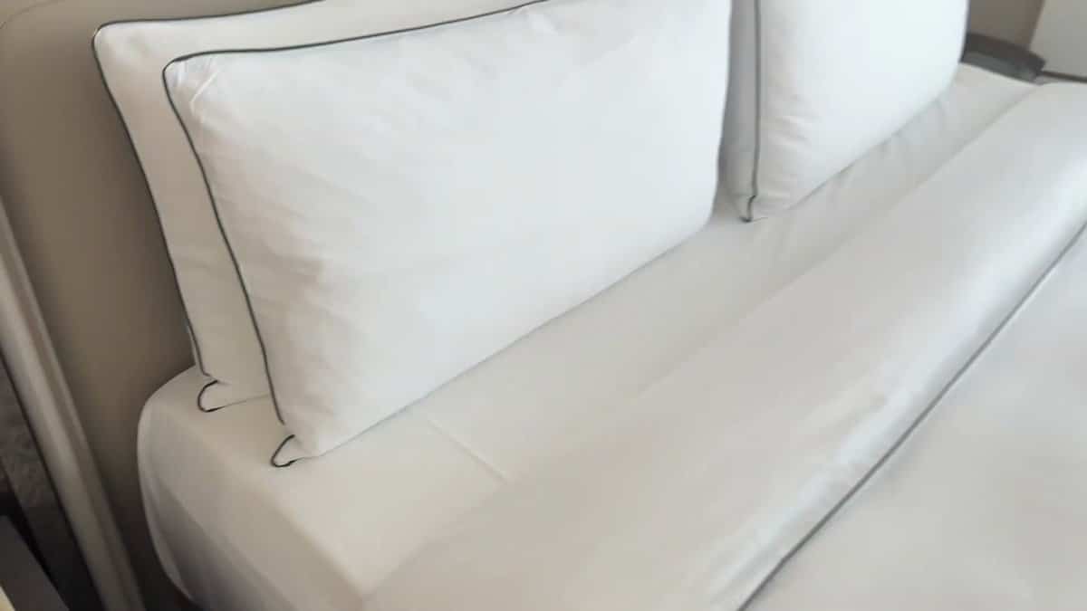 The pillows at the head of the bed,