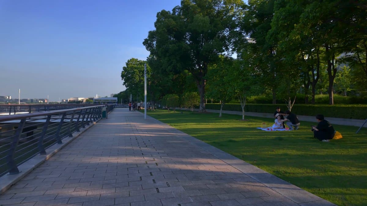 The promenade curving away with lawns spreading beside