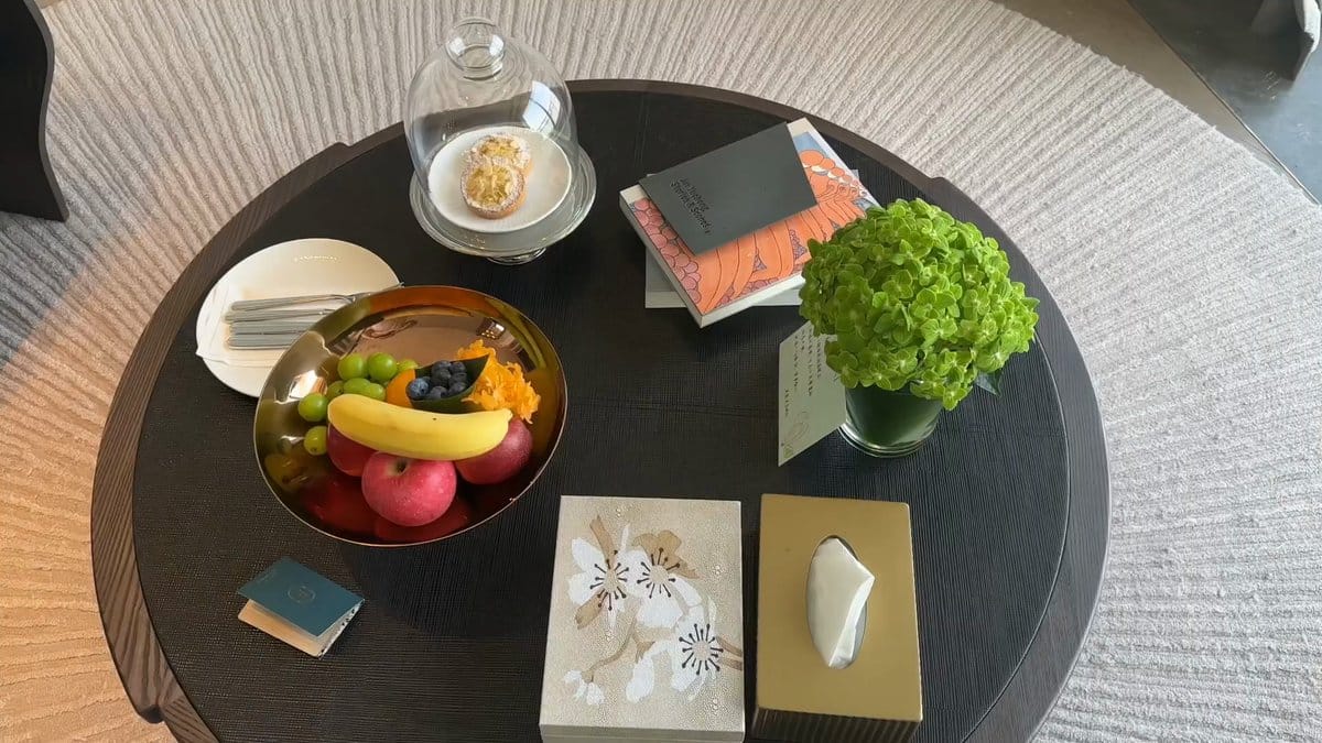 The round table laid with the welcome tray