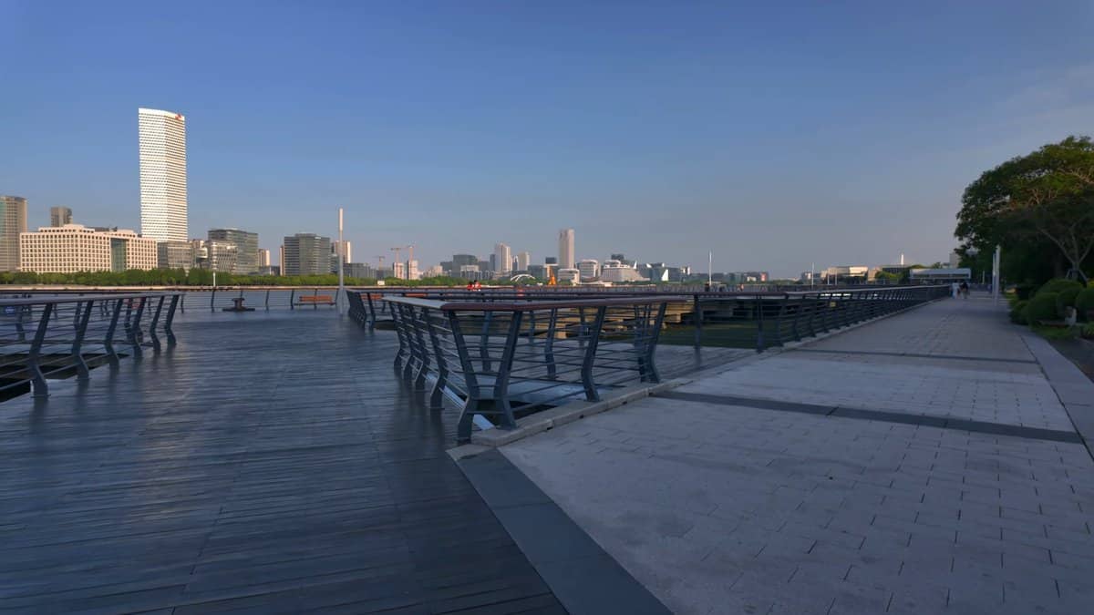 The stepped waterfront with a white tower standing