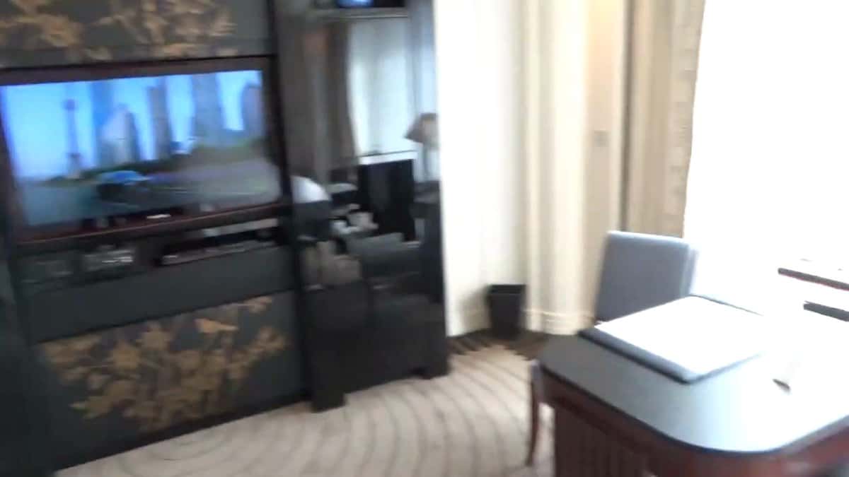 The television and lacquer cabinet from the desk