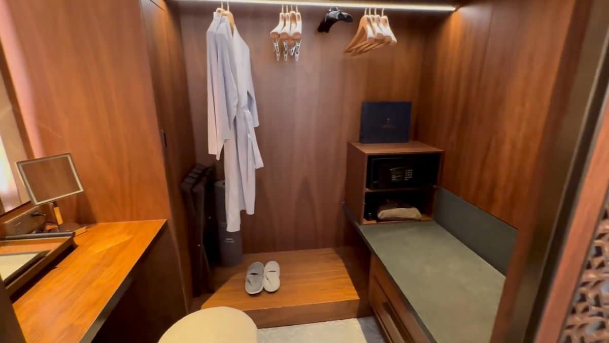 Timber-lined walk-in wardrobe