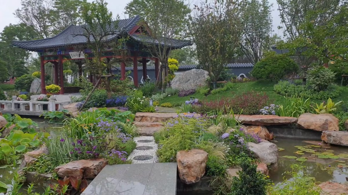 Timber pavilion above a rocky pool