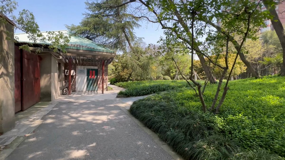Traditional green-tiled garden gateway