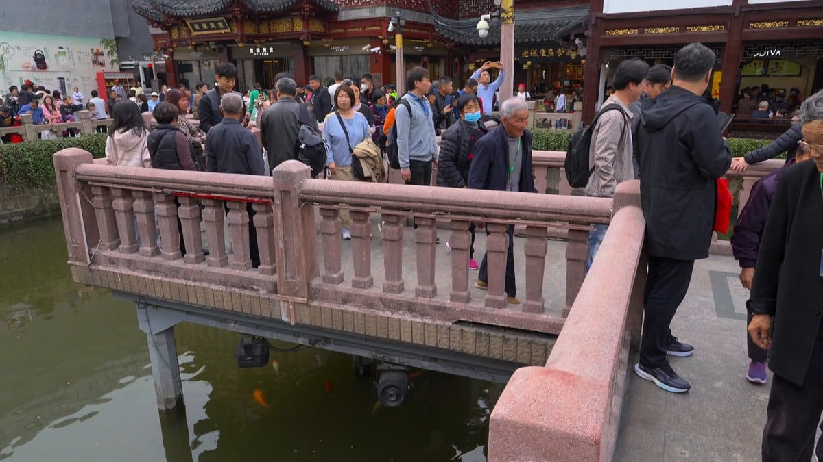 Visitors crossing the zigzag bridge