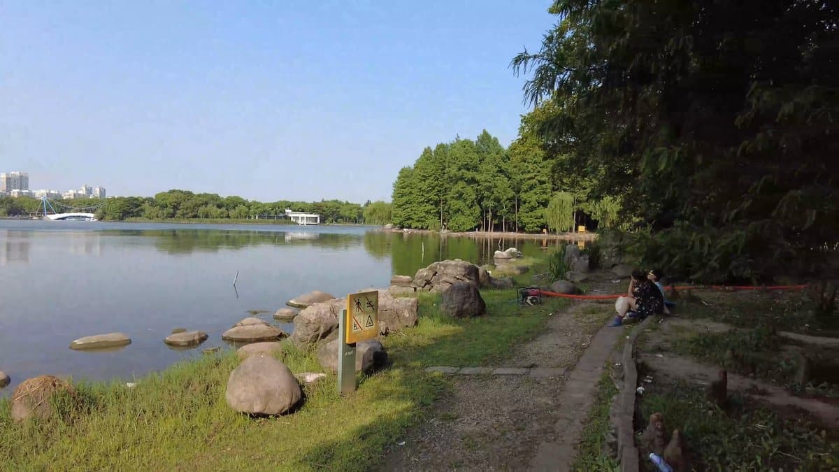 Visitors resting at the water