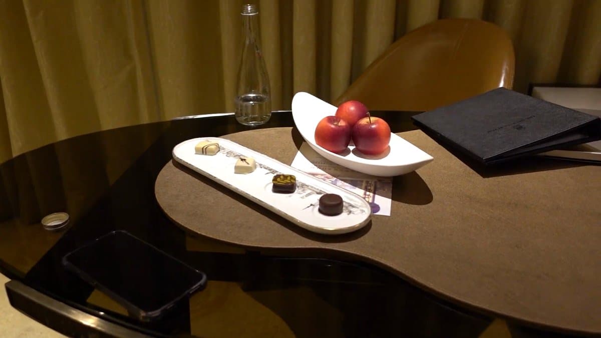Welcome table with glass carafe