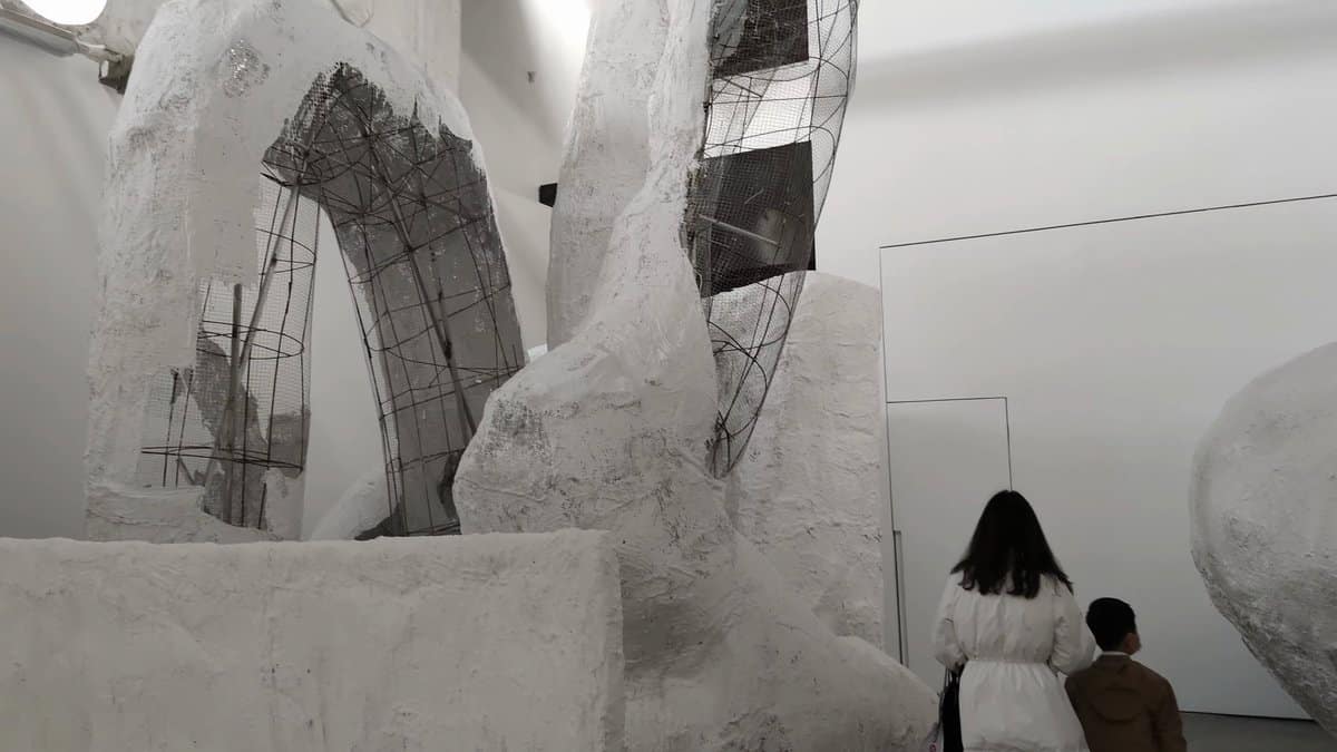White sculptural forms in the gallery