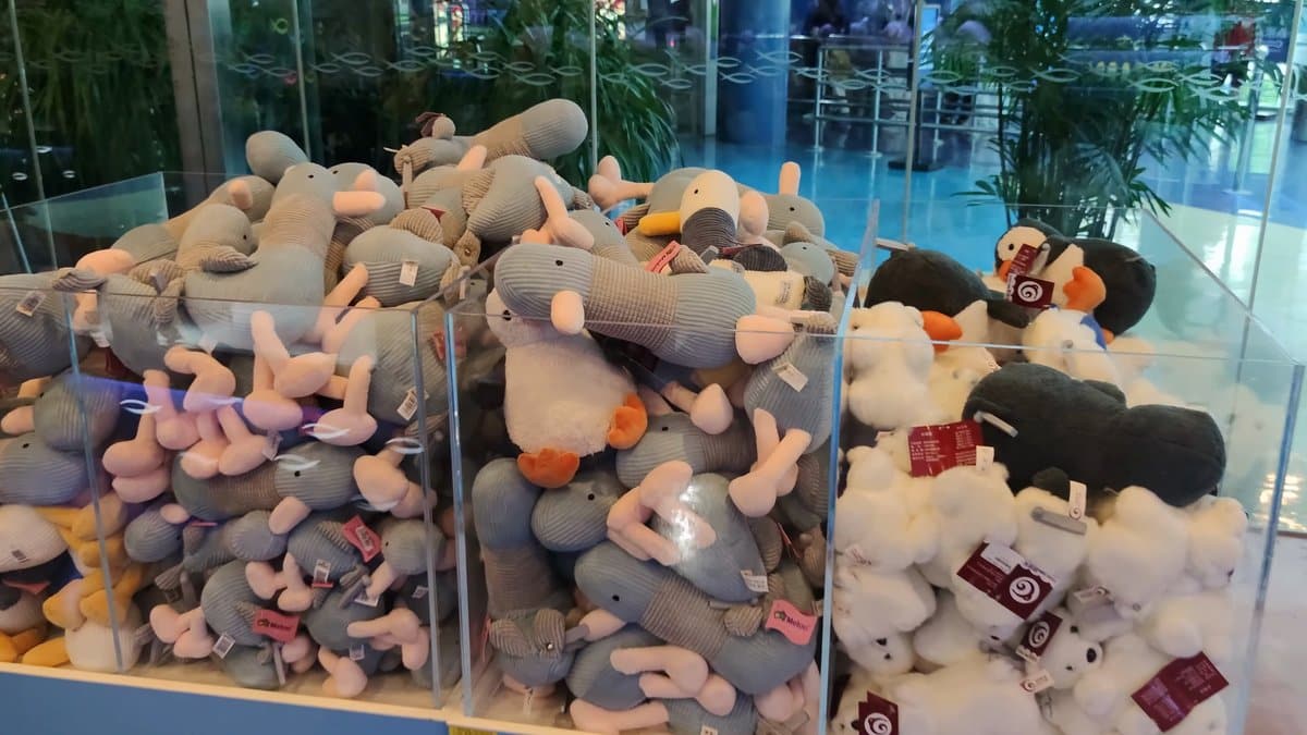 A bin heaped with plush toys.