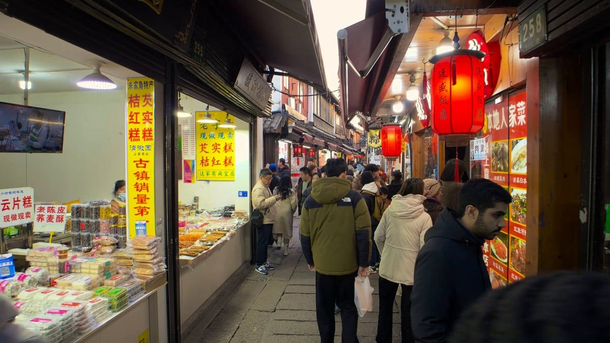 A brightly lit shop counter with packaged goods,