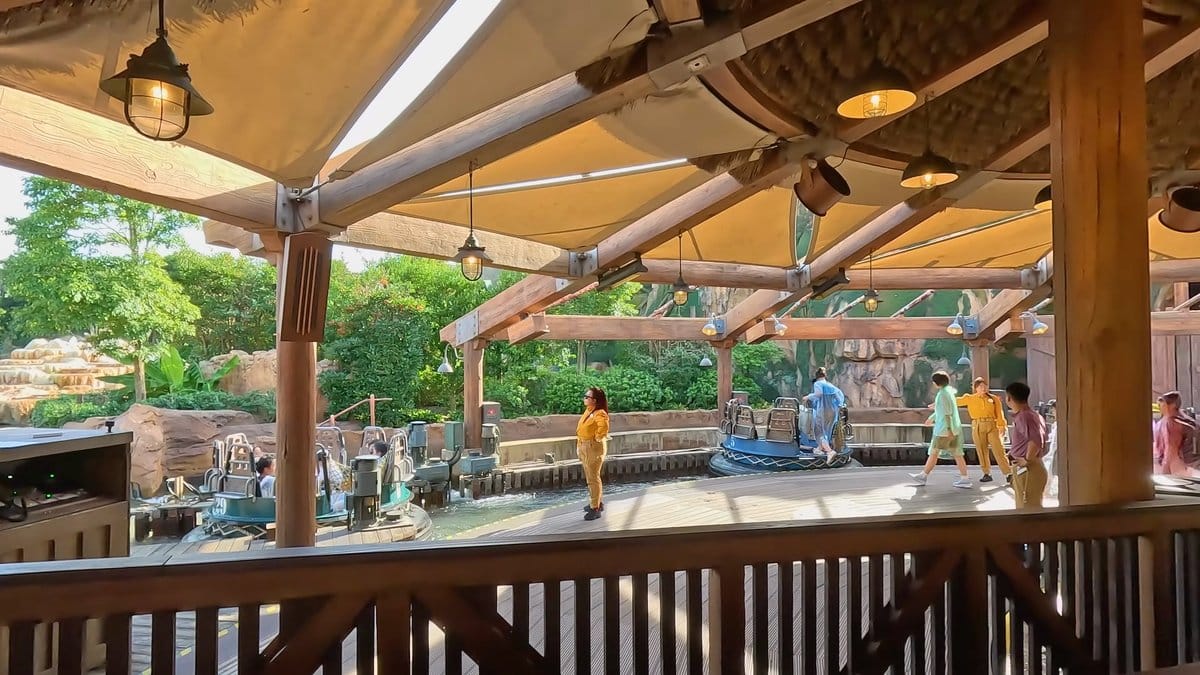 A covered viewing area overlooking the rafting river.