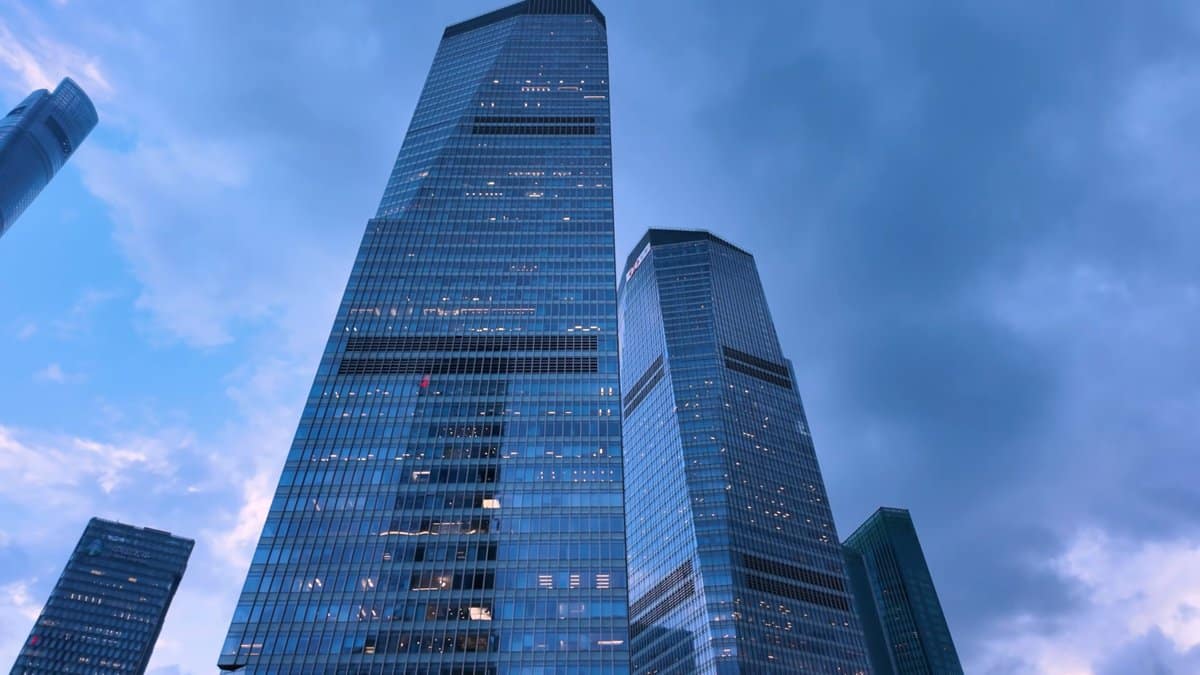 A glass supertall seen from its base, its