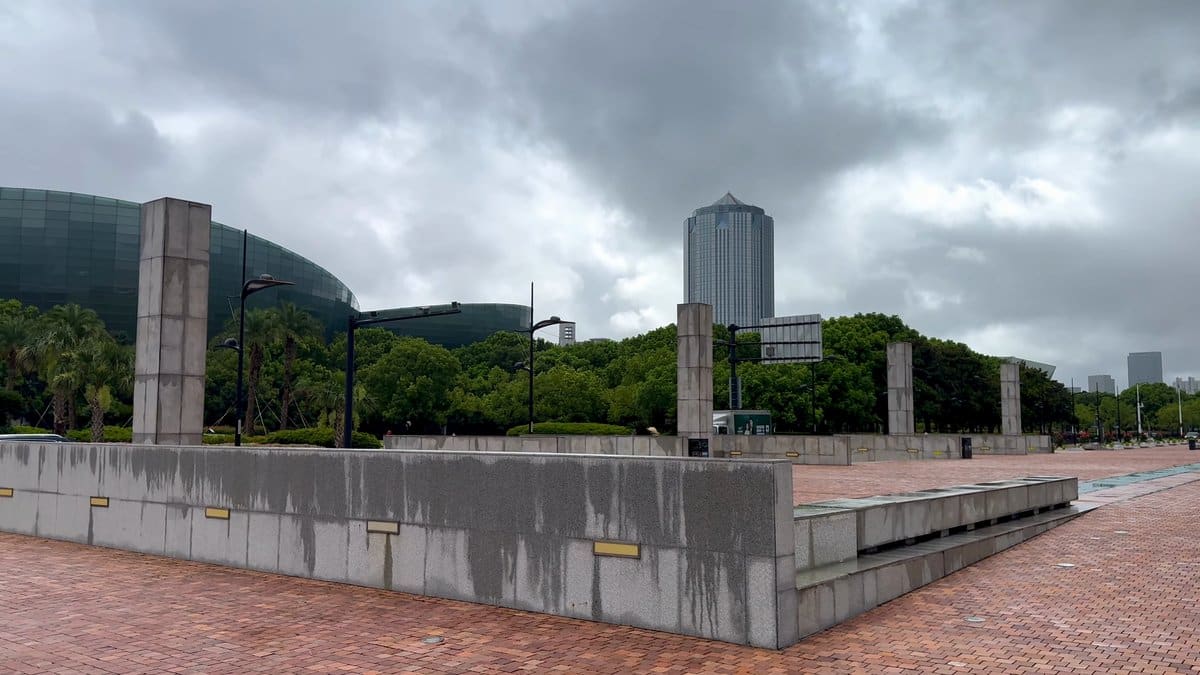 A plaza of standing stone slabs and a