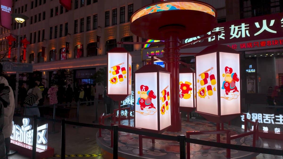 A red lamp pillar topped with a painted