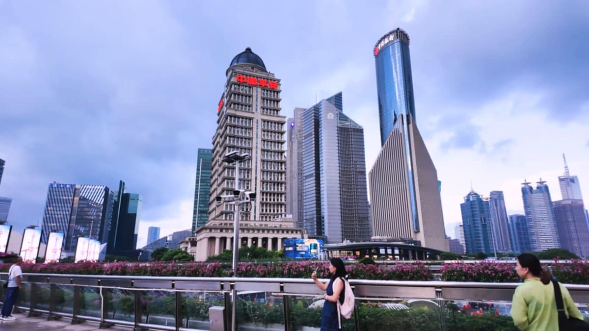 A stepped tower with a red crown ahead,