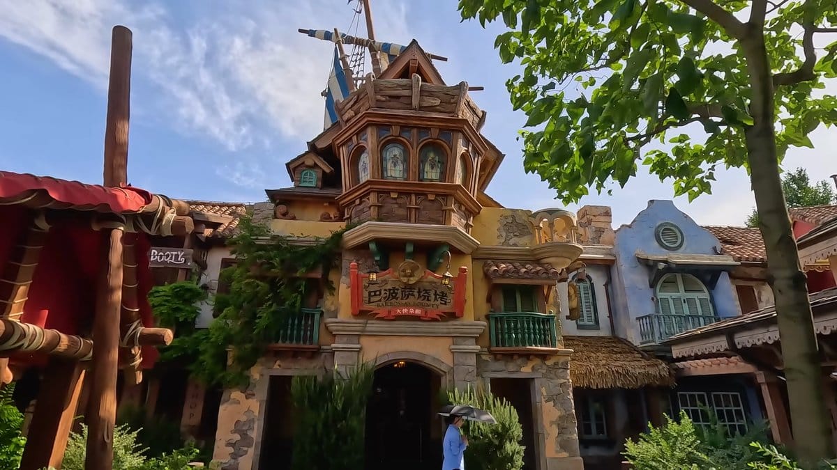 A tall ornate timber building in Treasure Cove.