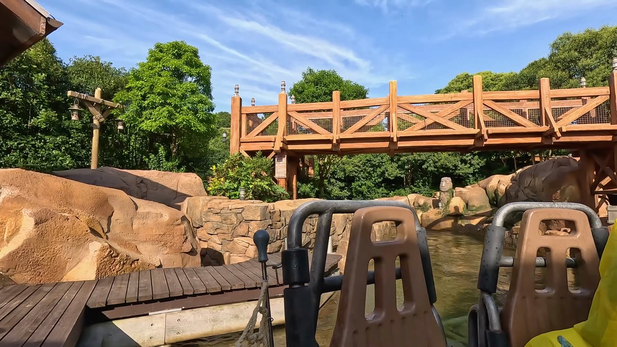 A timber bridge above the rocks from a