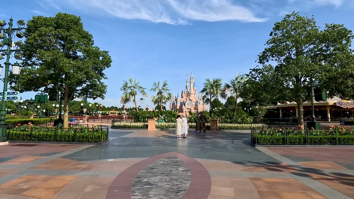 A wide paved plaza leading toward the castle