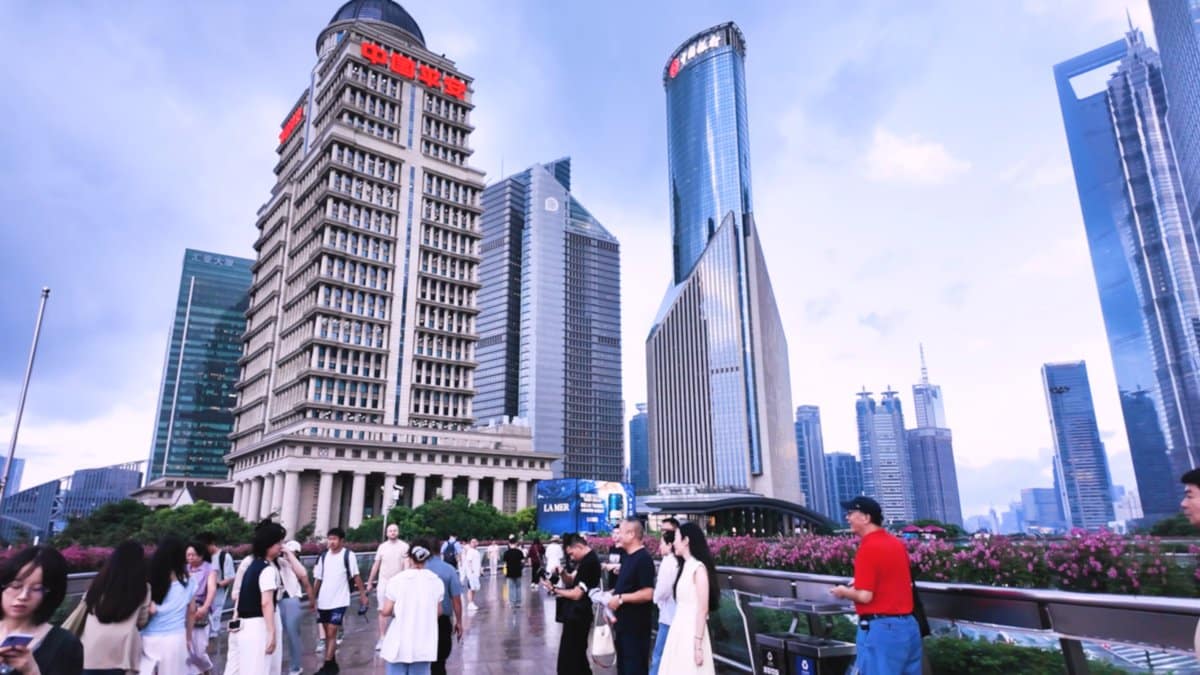 An office tower with red lettering at its