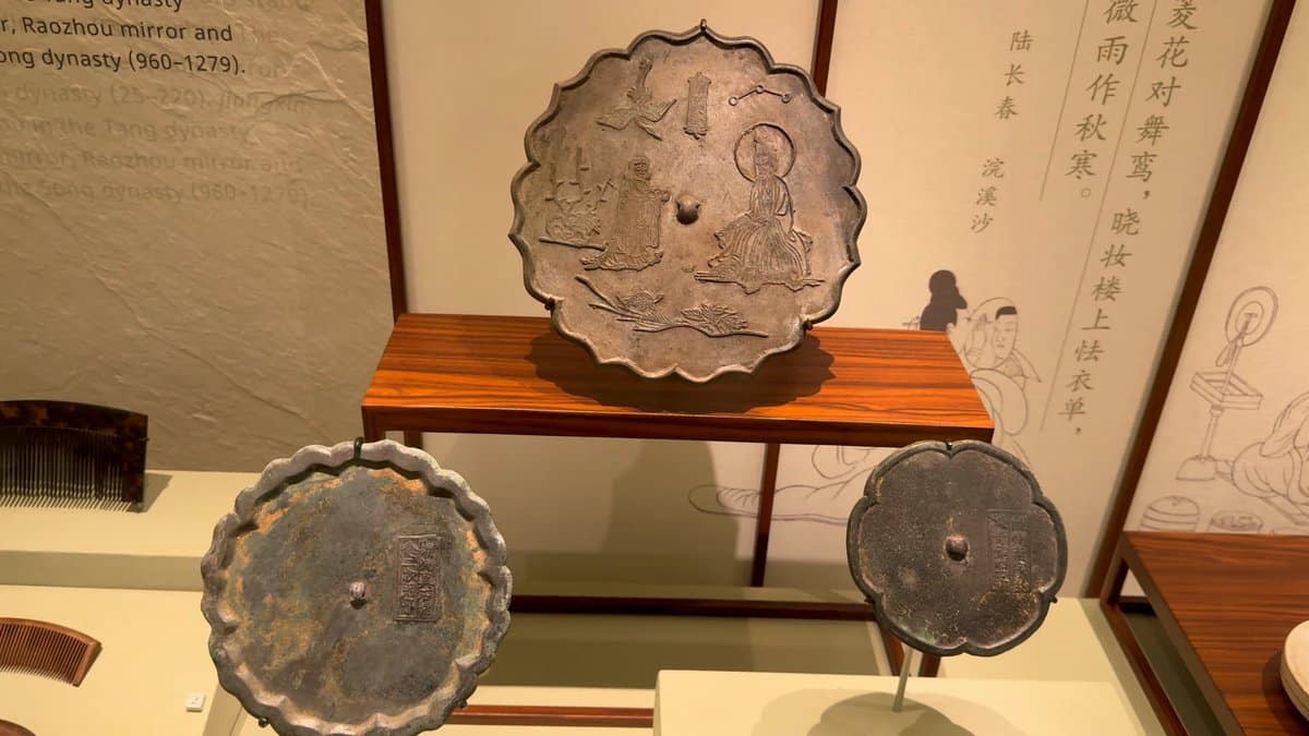 Ancient bronze mirrors on stands
