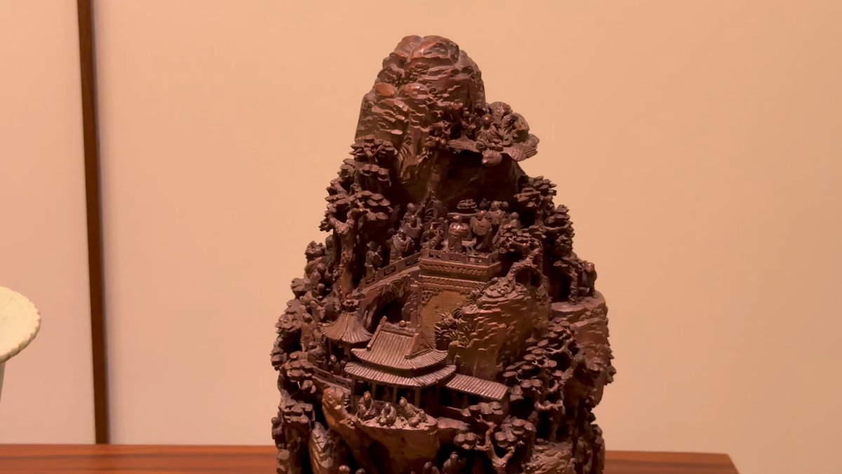 Carved mountain landscape sculpture