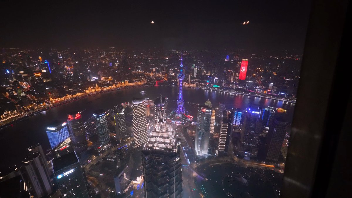 City and river bend at night