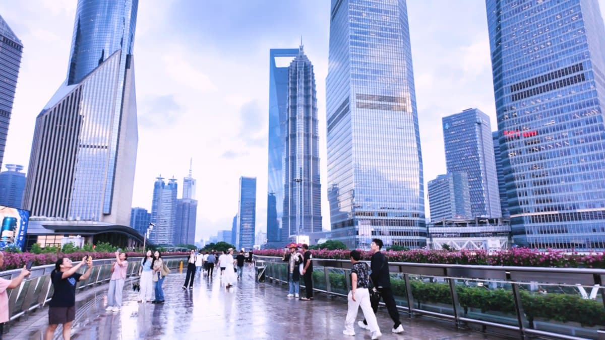 Crowds crossing the elevated skywalk