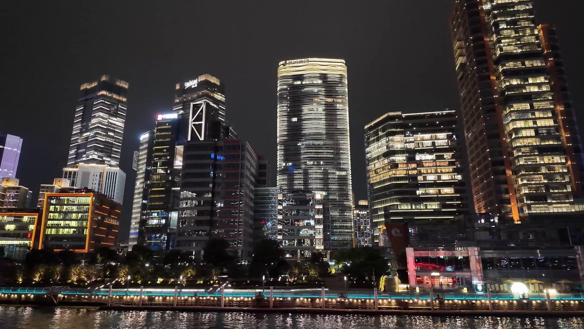 Dense Puxi towers from the water