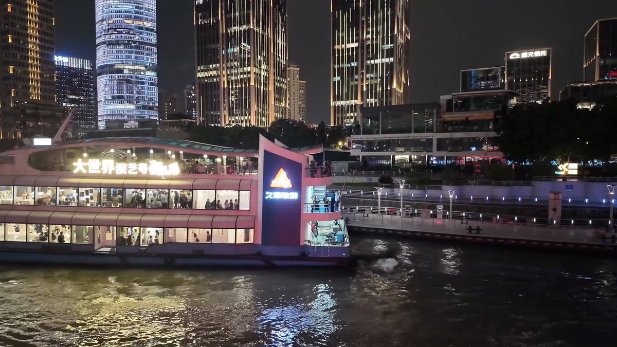 Double-deck cruise boat at the pier