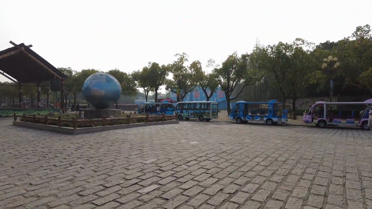 Entrance plaza with globe sculpture