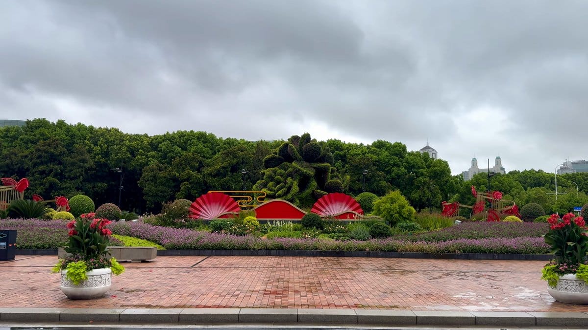 Flowerbeds and topiary in the riverside park on