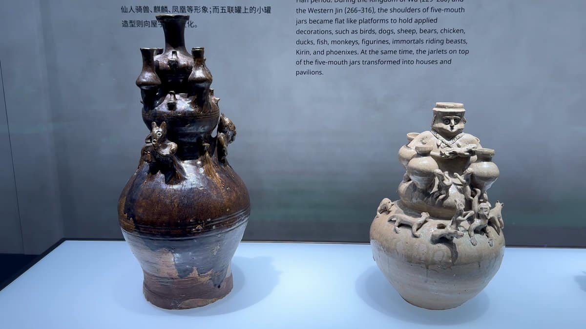 Funerary jars with modelled figures