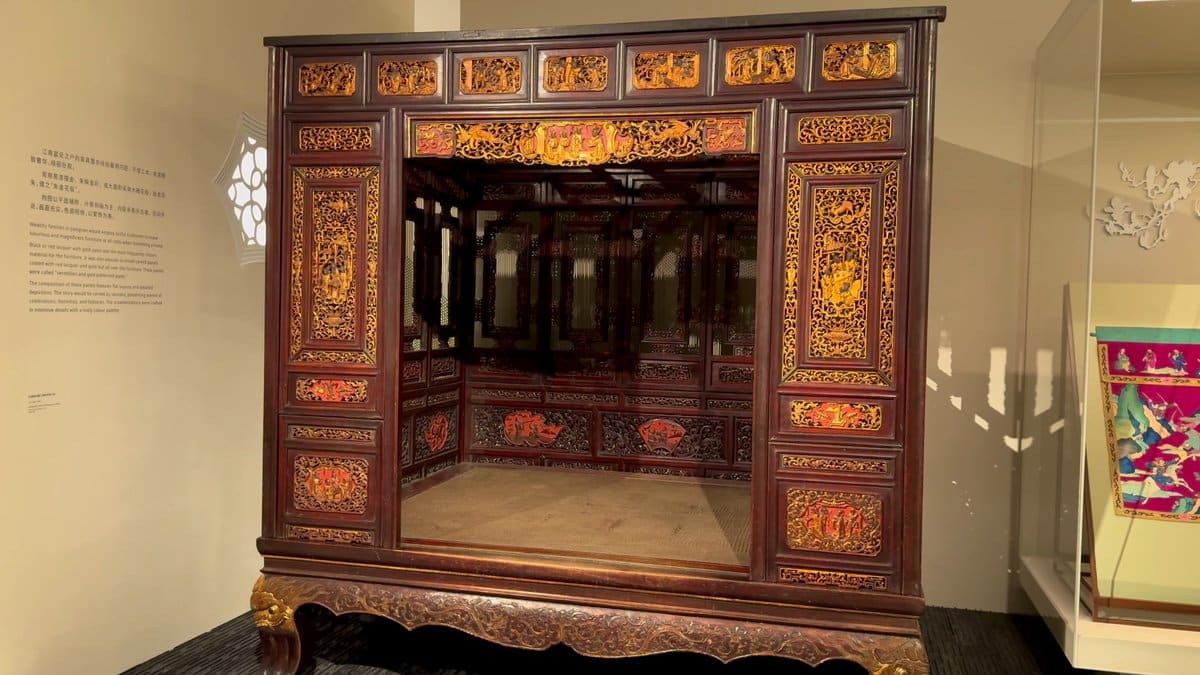 Gilded wooden canopy bed