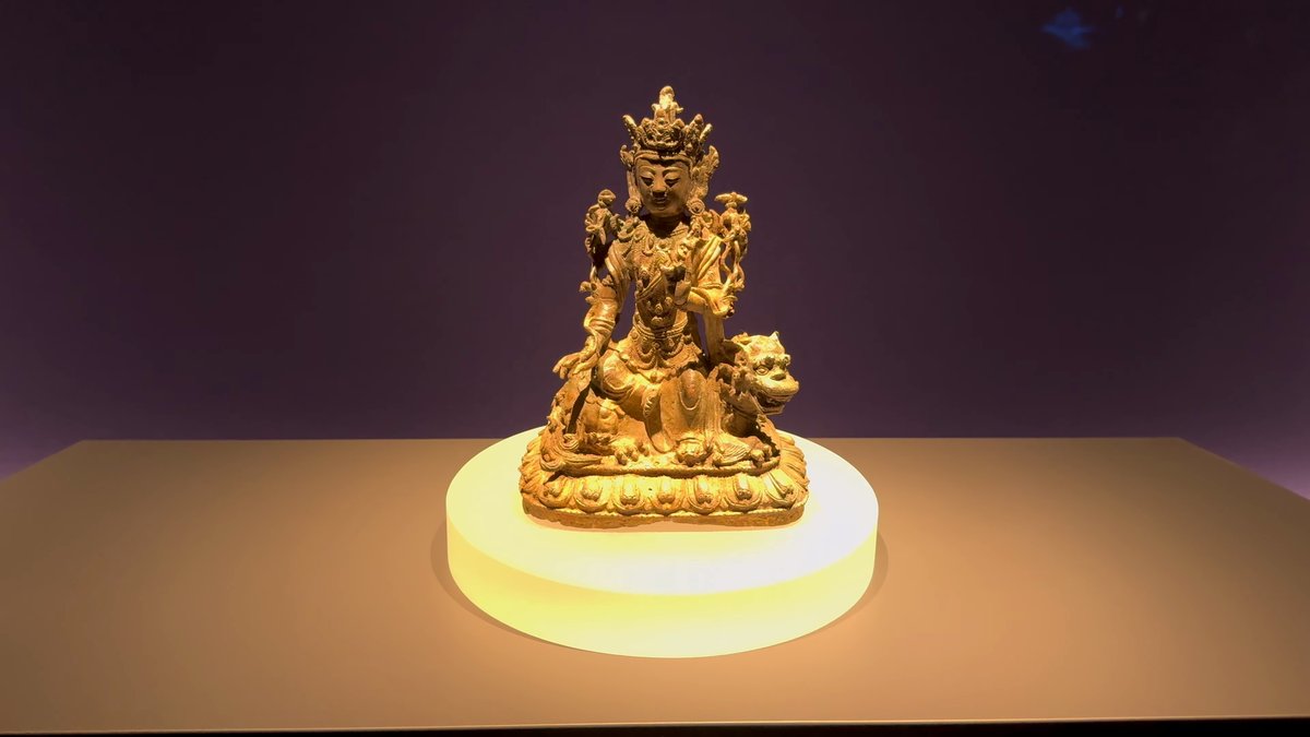 Gilt bronze Buddha on lotus