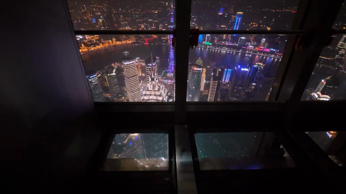 Glass floor over lit streets below