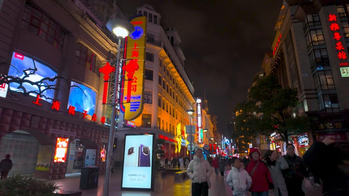 Gold-lit heritage department store facades