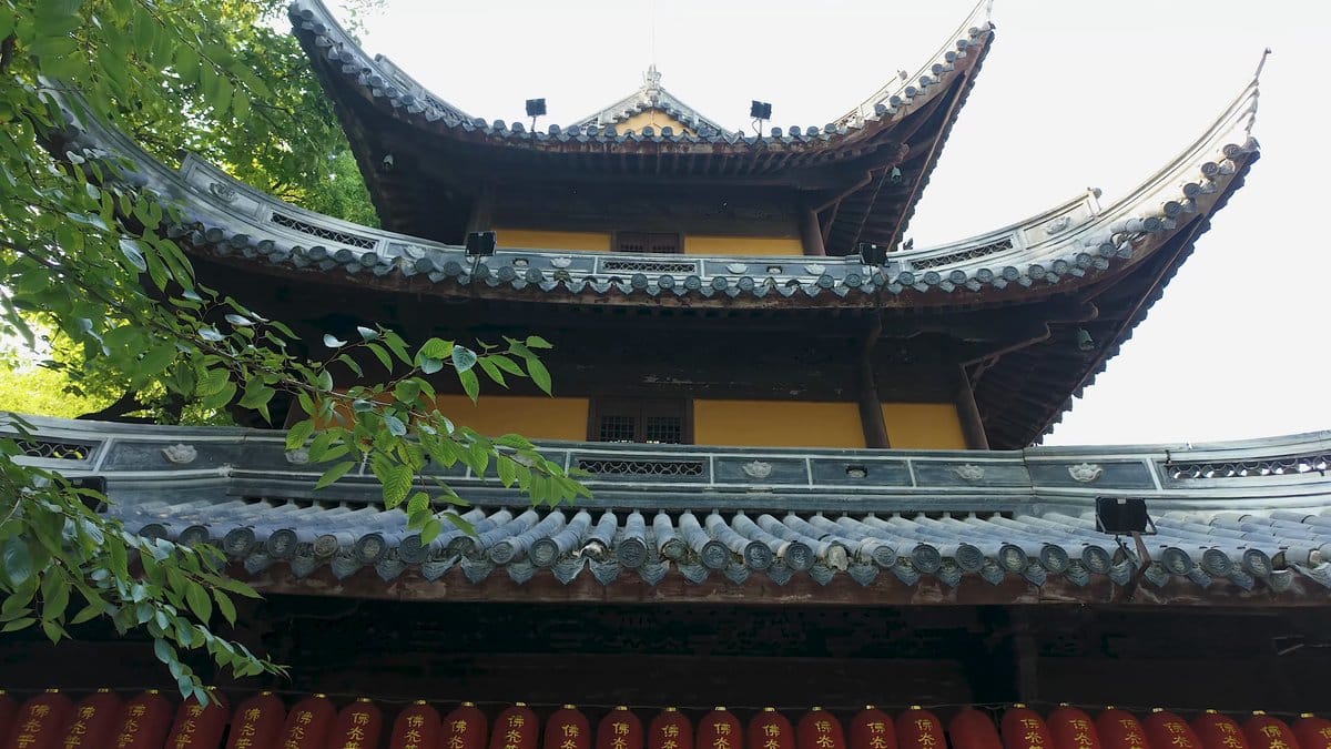 Hall roof rising above temple walls