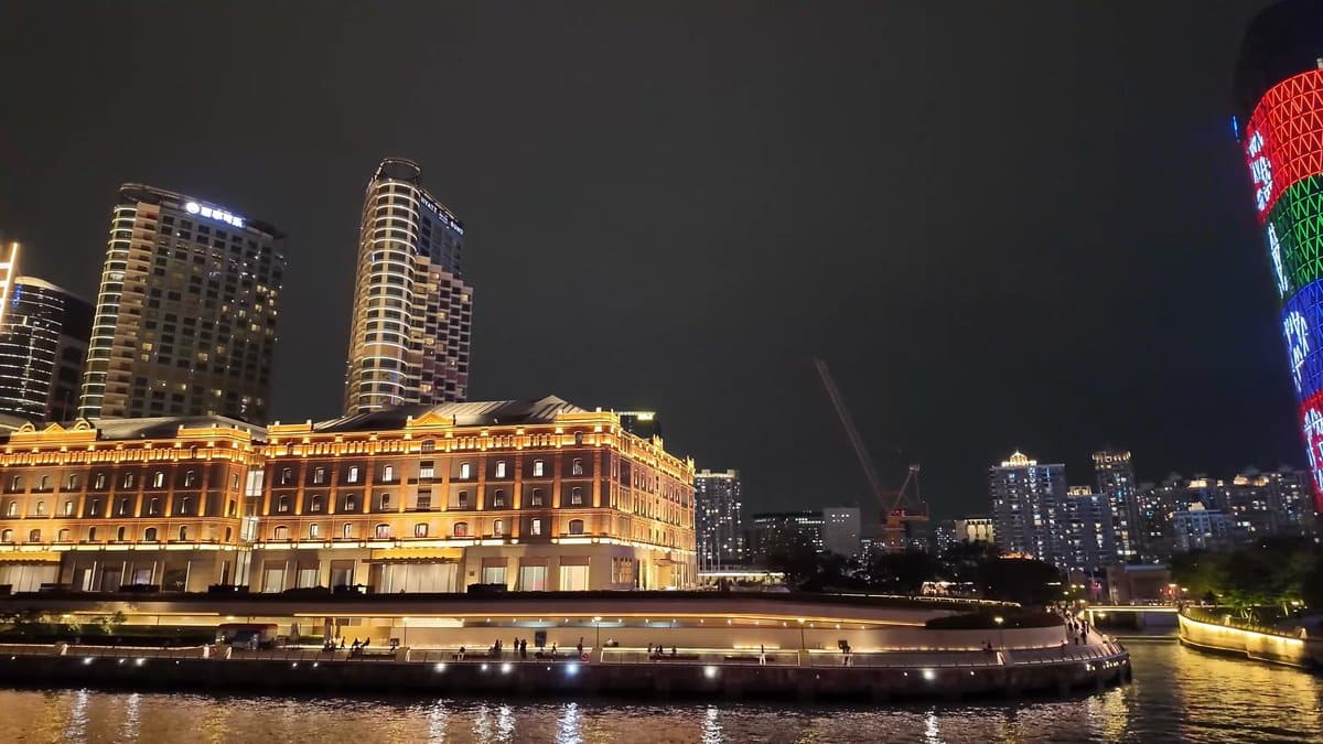 Historic stone buildings lit gold