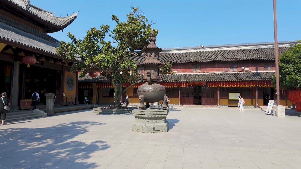 Incense tower among surrounding halls