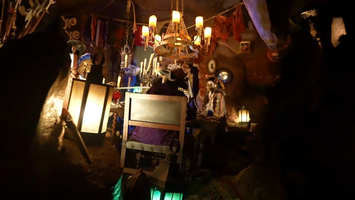 Inside the ride, a candlelit cabin with a