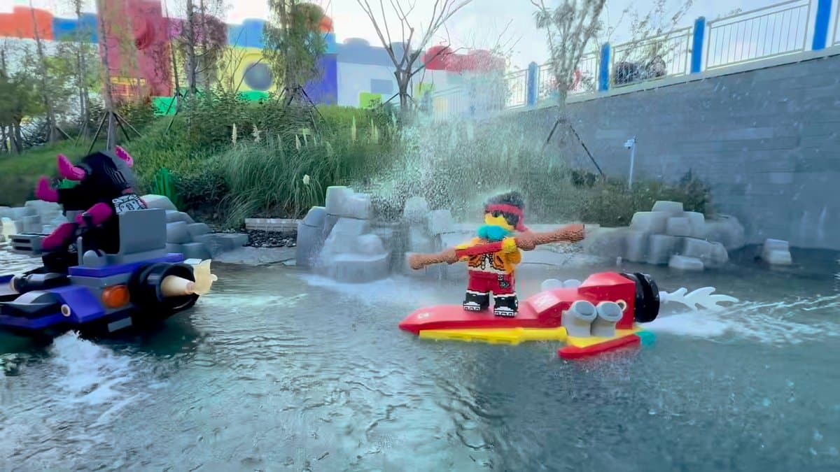Jet-skis bursting under stone bridge