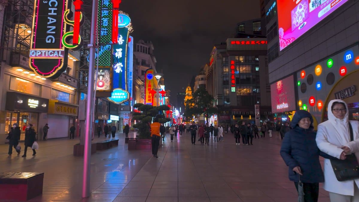 Neon signs lining the shopping street
