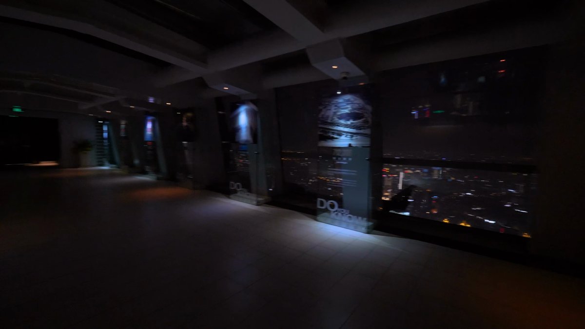 Observation hall overlooking city lights