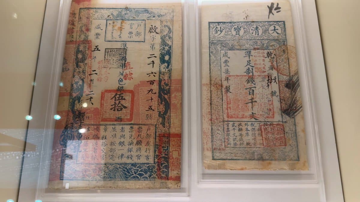 Old printed paper notes covered in seals and